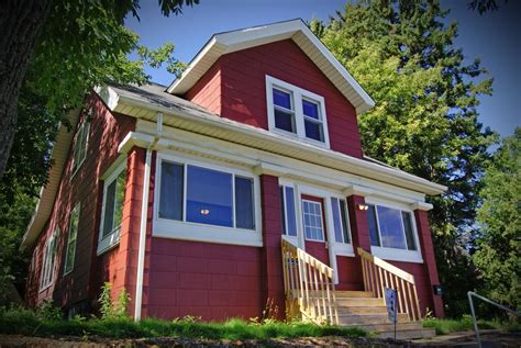 There are nine bedrooms total, plus two kitchens, two living rooms, three full bathrooms, and off-street parking for seven cars. . Rental duluth mn